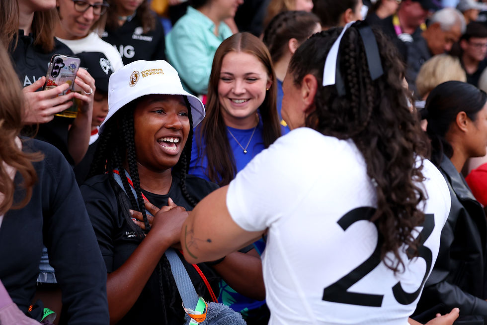 Black Ferns star Portia Woodman-Wickliffe meets fans in the crowd at the Women's Rugby World Cup 2025.