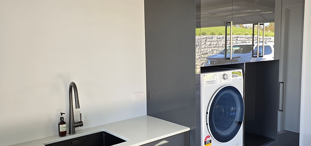 Modern laundry room design with LG washer and dryer