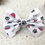Thumbnail: White christmas dog bow tie with santa hats