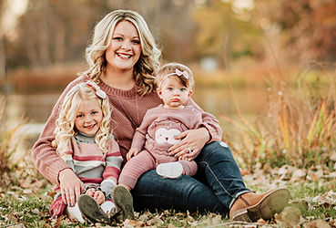 mom and daughters in fall