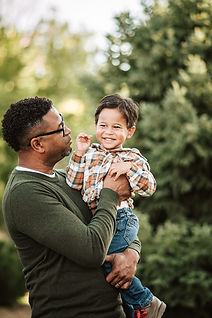 dad plays with son
