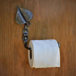 Toilet paper holder forged from a railro