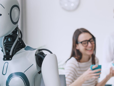 AI robot in the foreground; professionals in the background