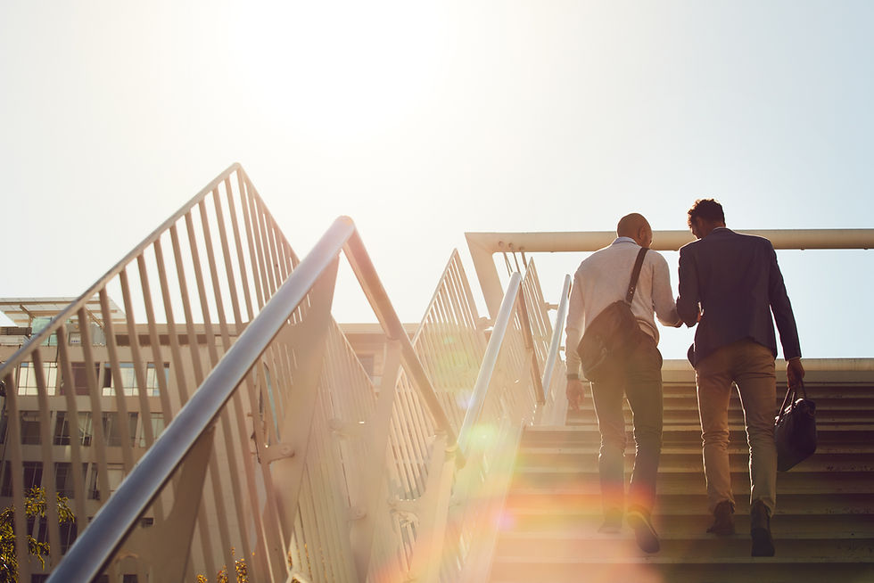 Two professionals walking together representing RVN strategic advisory partnership