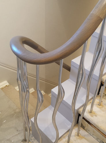 Bespoke staircase handrail and balustrade joinery by Vertex Construction
