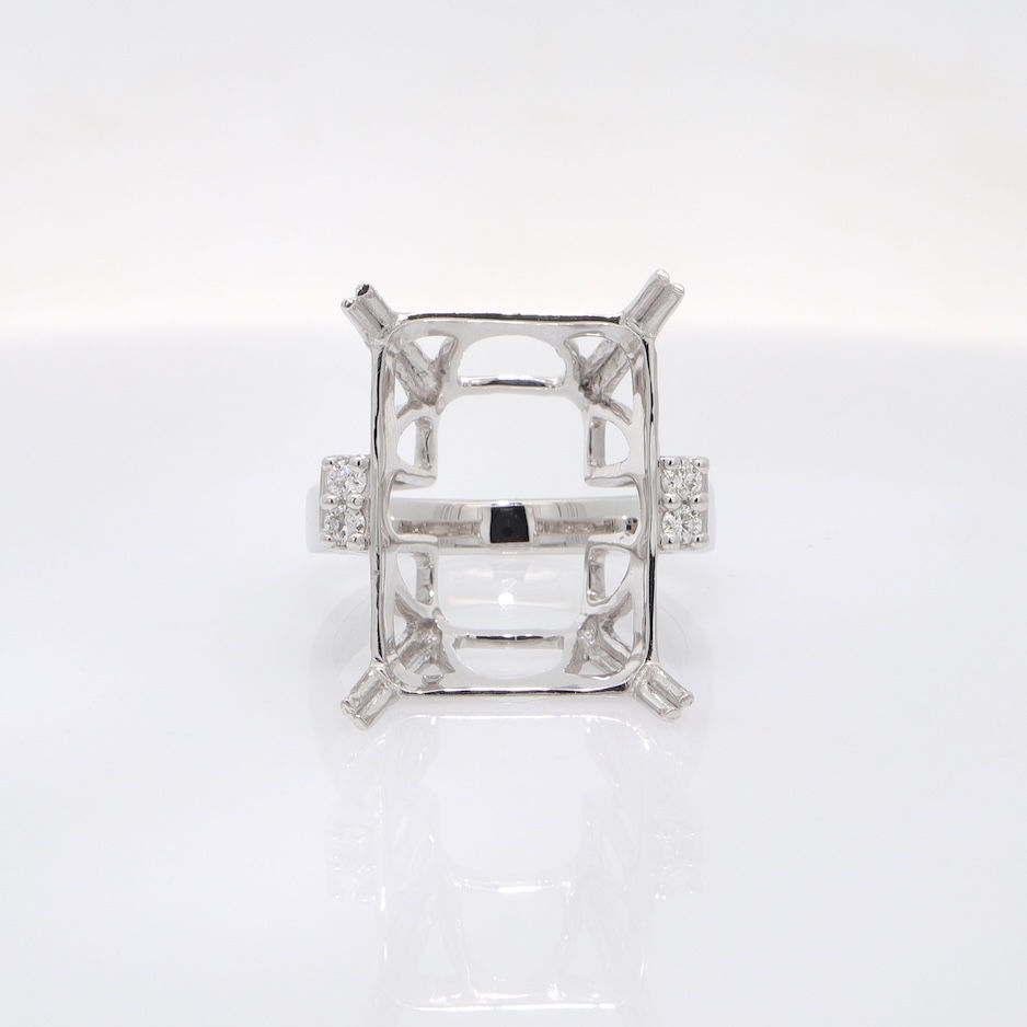 Classic diamond engagement ring setting with round diamond side clusters in fine gold.
