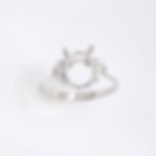 Art Deco fan cluster diamond engagement ring setting with baguette and round diamonds in gold.