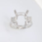 Art Deco diamond engagement ring setting with three-stone baguette diamond accents in fine gold.