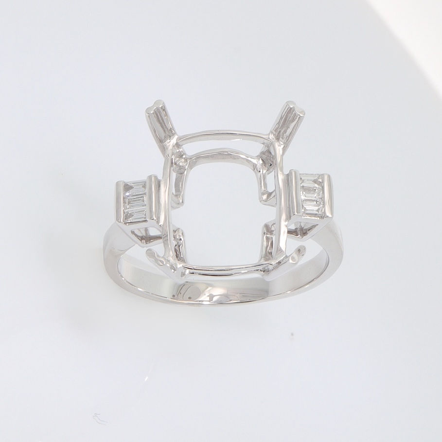 Art Deco diamond engagement ring setting with three-stone baguette diamond accents in fine gold.