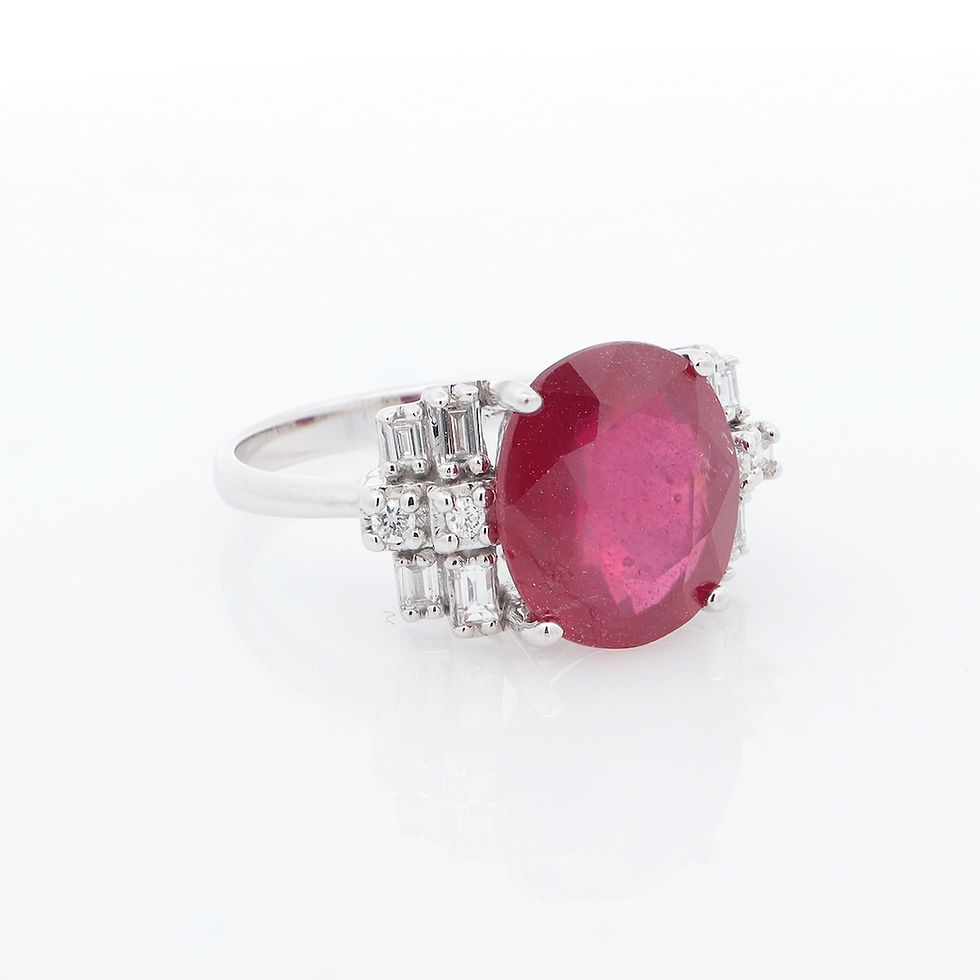 Thumbnail: Asymmetrical diamond ring with avant-garde clusters of baguette and round diamonds in fine gold.