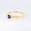 Thumbnail: Petite oval blue sapphire ring with diamond accents on band
