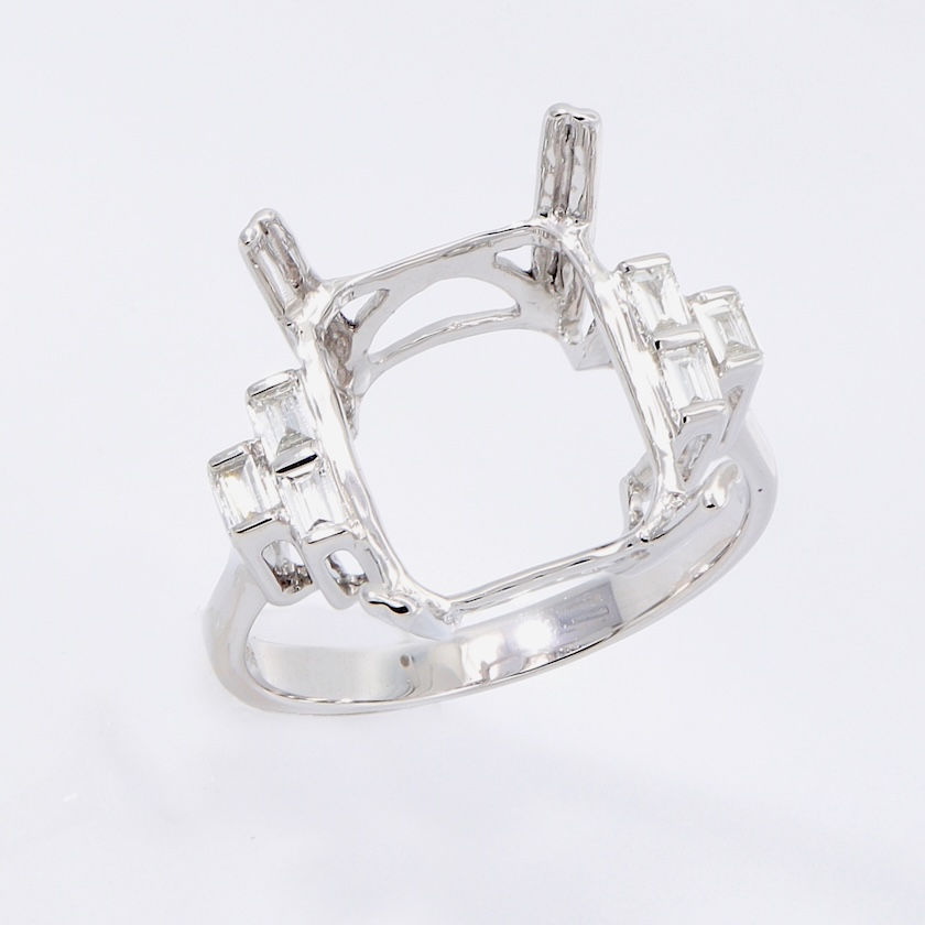 Art Deco engagement ring setting with graduated baguette diamonds in fine gold.