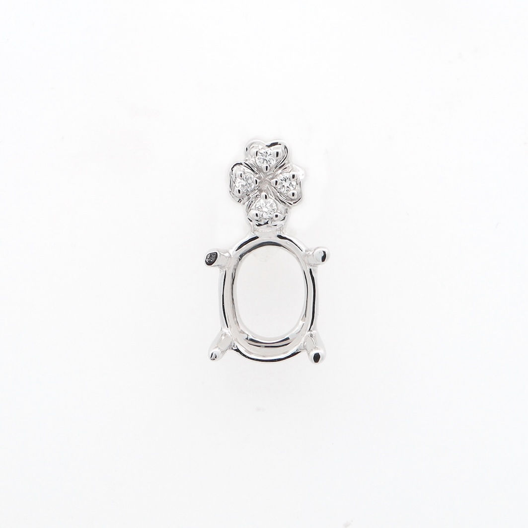 Oval pendant setting with a floral diamond cluster bail in fine gold.