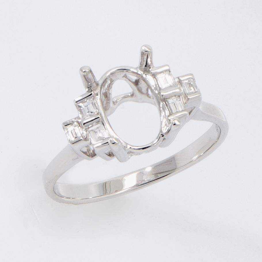 Thumbnail: Art Deco engagement ring setting with geometric clusters of baguette and princess-cut diamonds.