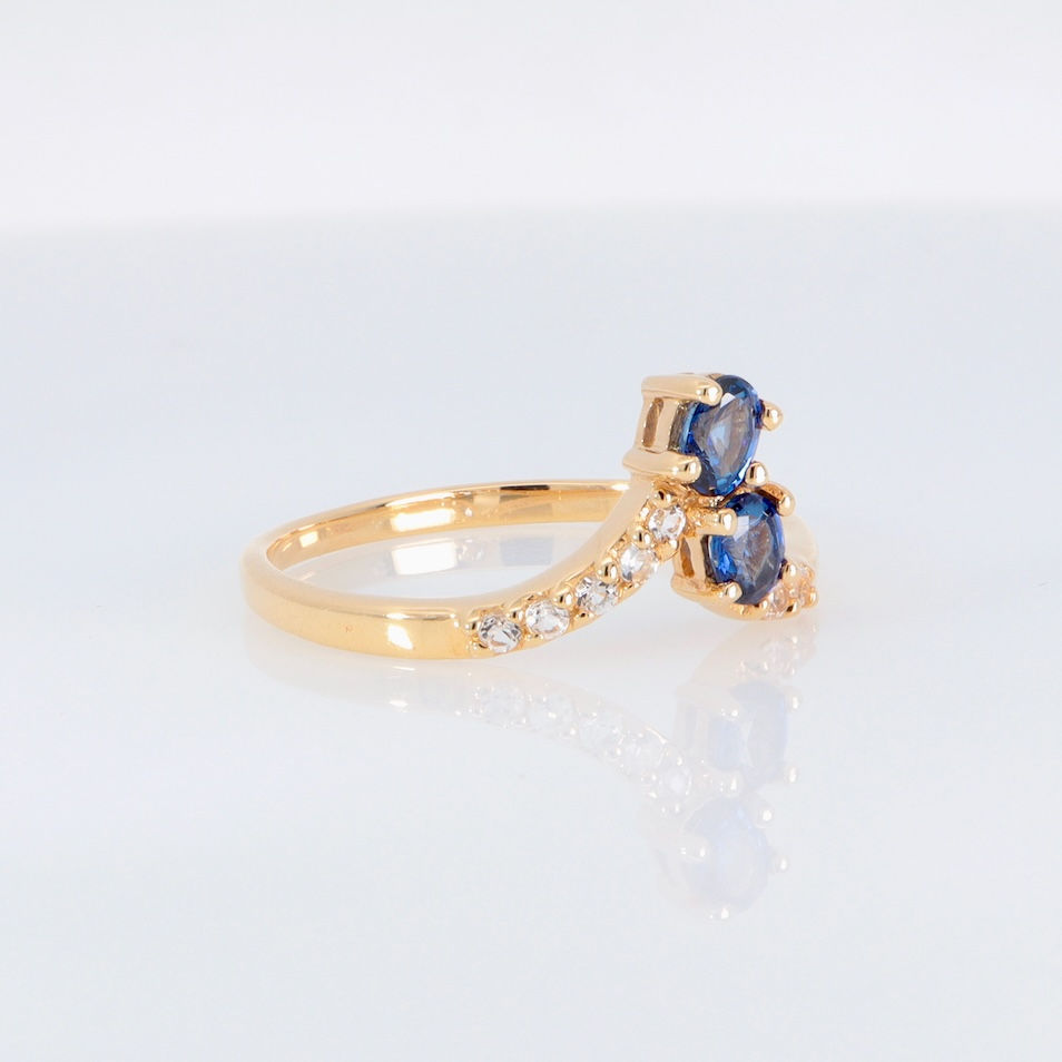 Thumbnail: Contemporary asymmetrical sapphire ring in gold with diamonds - modern custom jewelry by SVS Jewelry Bangkok