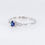 Thumbnail: Delicate sapphire diamond engagement ring with oval blue gemstone and side diamonds