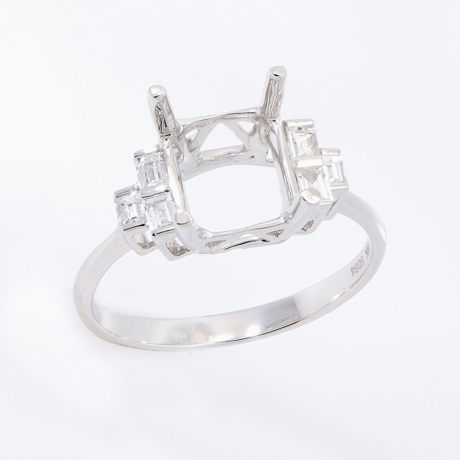 Thumbnail: Art Deco engagement ring setting with geometric baguette diamond clusters in fine gold.