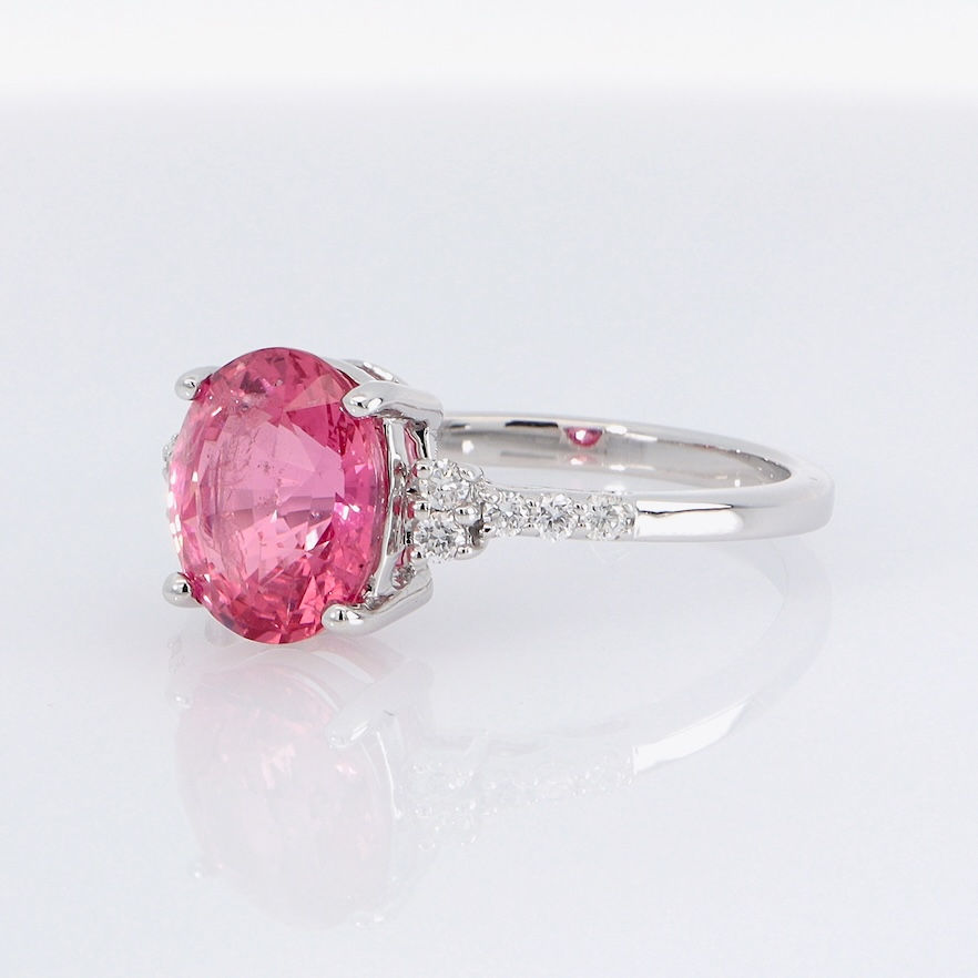 Thumbnail: Classic diamond engagement ring setting with pavé diamond accents and a polished gold band.