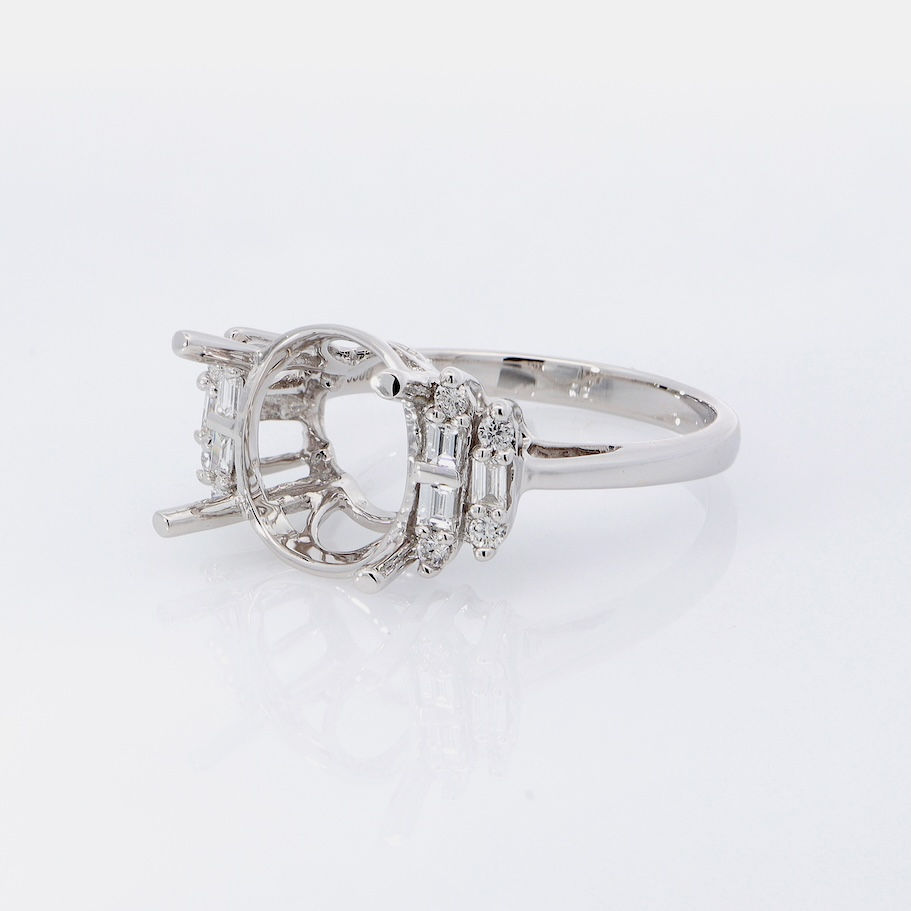 Thumbnail: Art Deco baguette diamond ring setting with round diamond accents in a custom fine gold design.