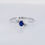 Thumbnail: Three-stone oval blue sapphire ring with diamond accents