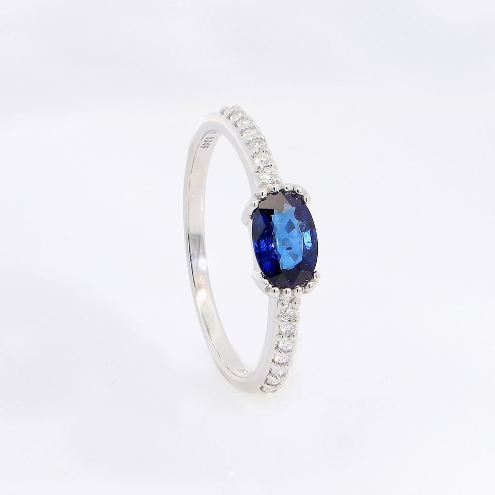 Thumbnail: Minimalist engagement ring setting for an emerald-cut stone with a pavé diamond gold band.