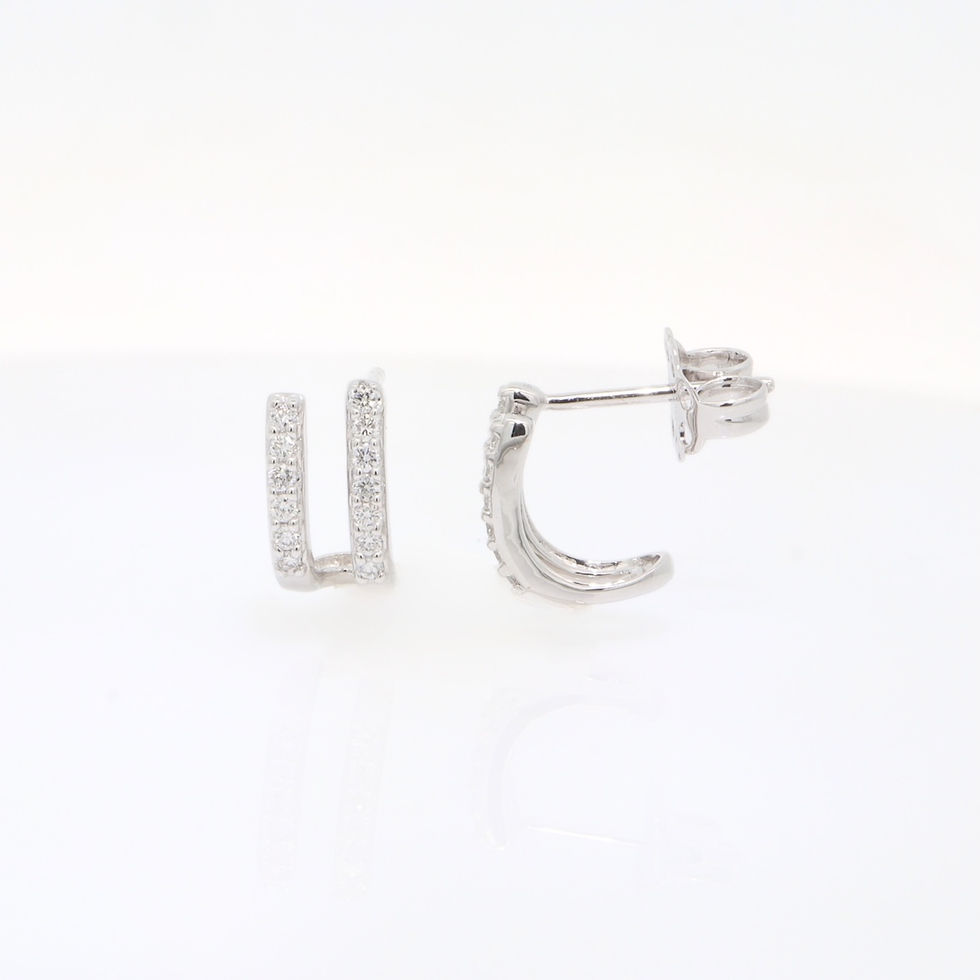 Thumbnail: Modern double row pavé diamond hoop earrings with a J-hoop design in fine gold.