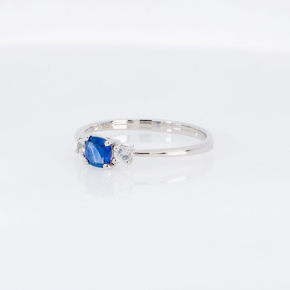 Thumbnail: Elegant three-stone sapphire engagement ring in gold with diamonds - custom fine jewelry by SVS Jewelry Bangkok