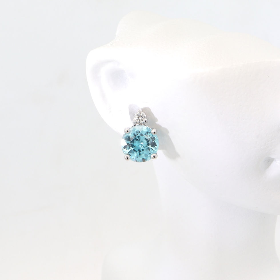 Round gemstone and diamond stud earrings in fine gold