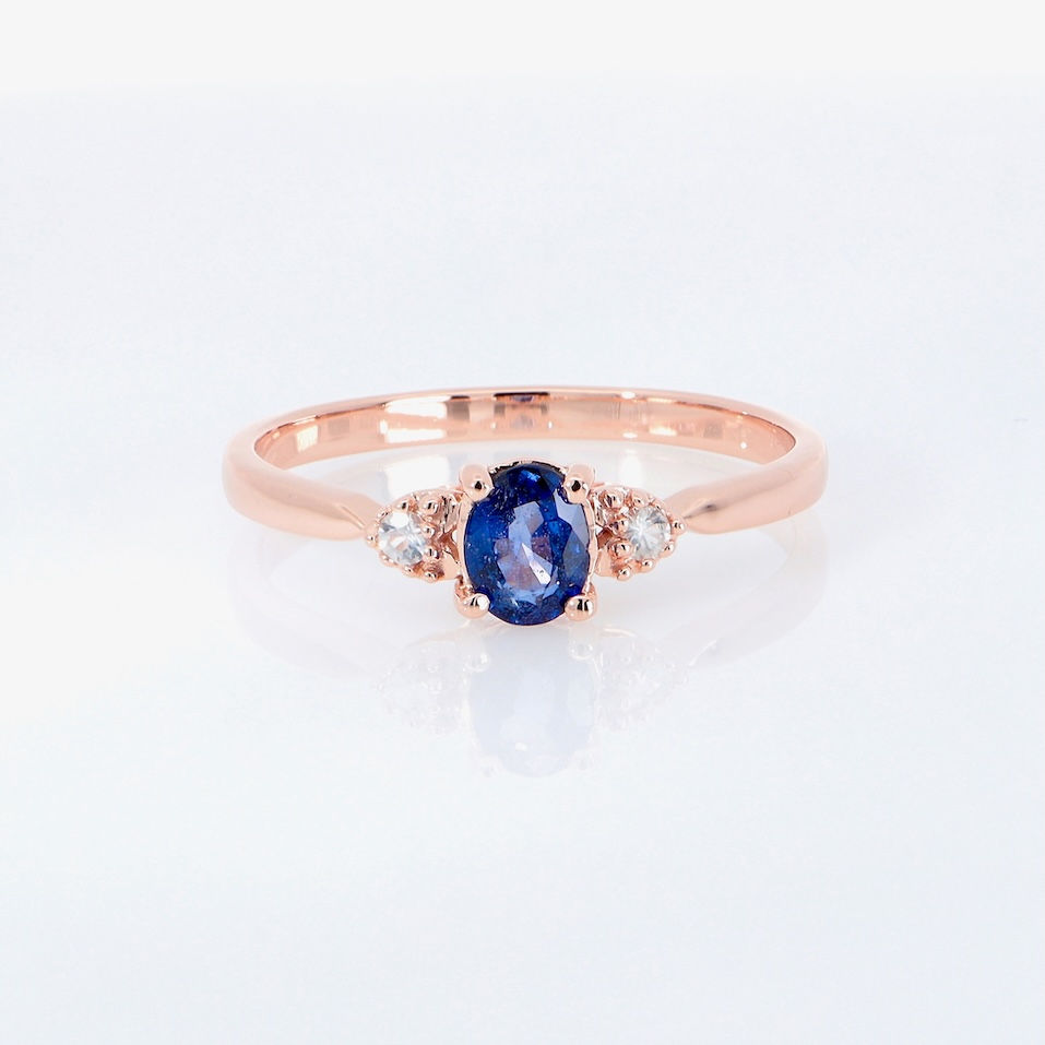 Thumbnail: Oval blue sapphire ring with heart-shaped diamond accents
