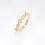 Thumbnail: Geometric diamond ring band with round diamonds set in marquise and square shapes in gold.
