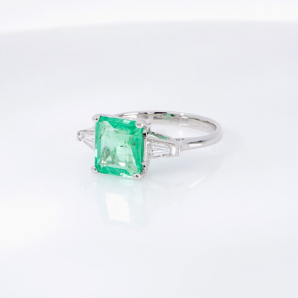 Thumbnail: Gemstone jewelry emerald ring in gold setting with diamond baguettes fine jewelry wholesale jewelry