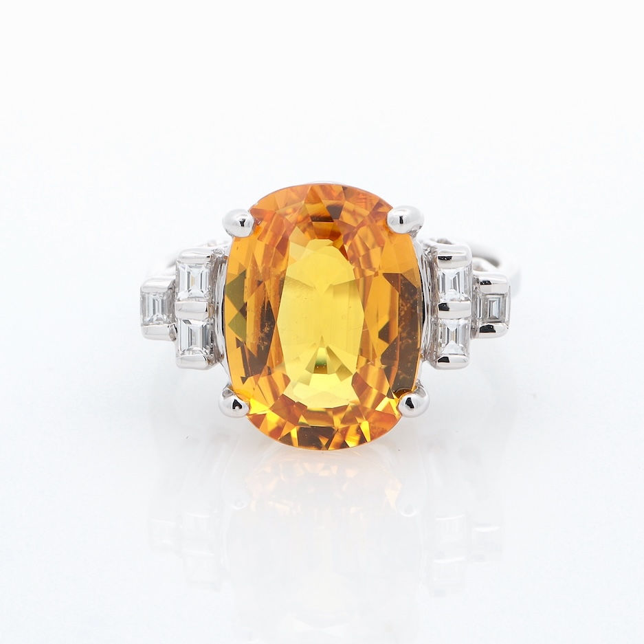 Thumbnail: Oval gemstone ring with baguette diamond shoulders in fine gold