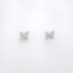 Classic illusion-set round diamond earrings in a square setting, handcrafted in fine gold.