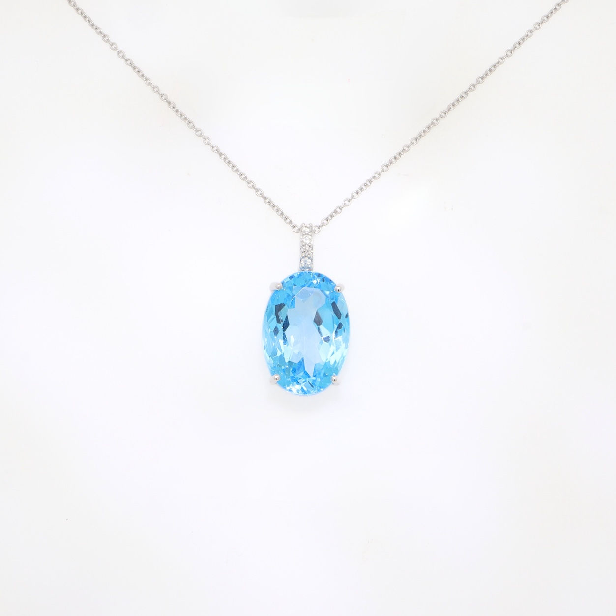 Large oval gemstone solitaire pendant in fine gold on chain