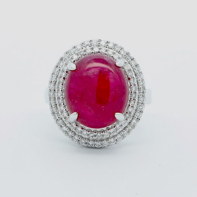 Oval double halo engagement ring setting with brilliant diamonds in a custom fine gold design.