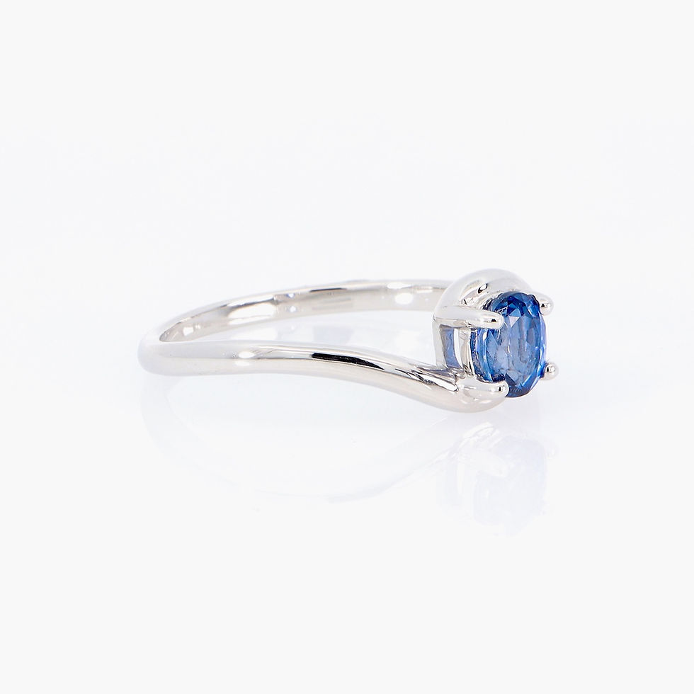 Thumbnail: Oval sapphire solitaire ring with bypass setting in gold