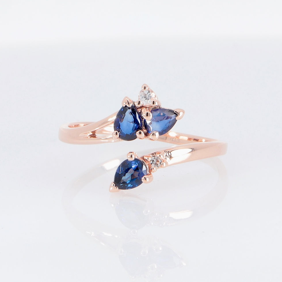 Thumbnail: Gold bypass sapphire diamond ring with oval & pear shaped stones - open design wholesale fine jewelry by SVS Jewelry Bangkok