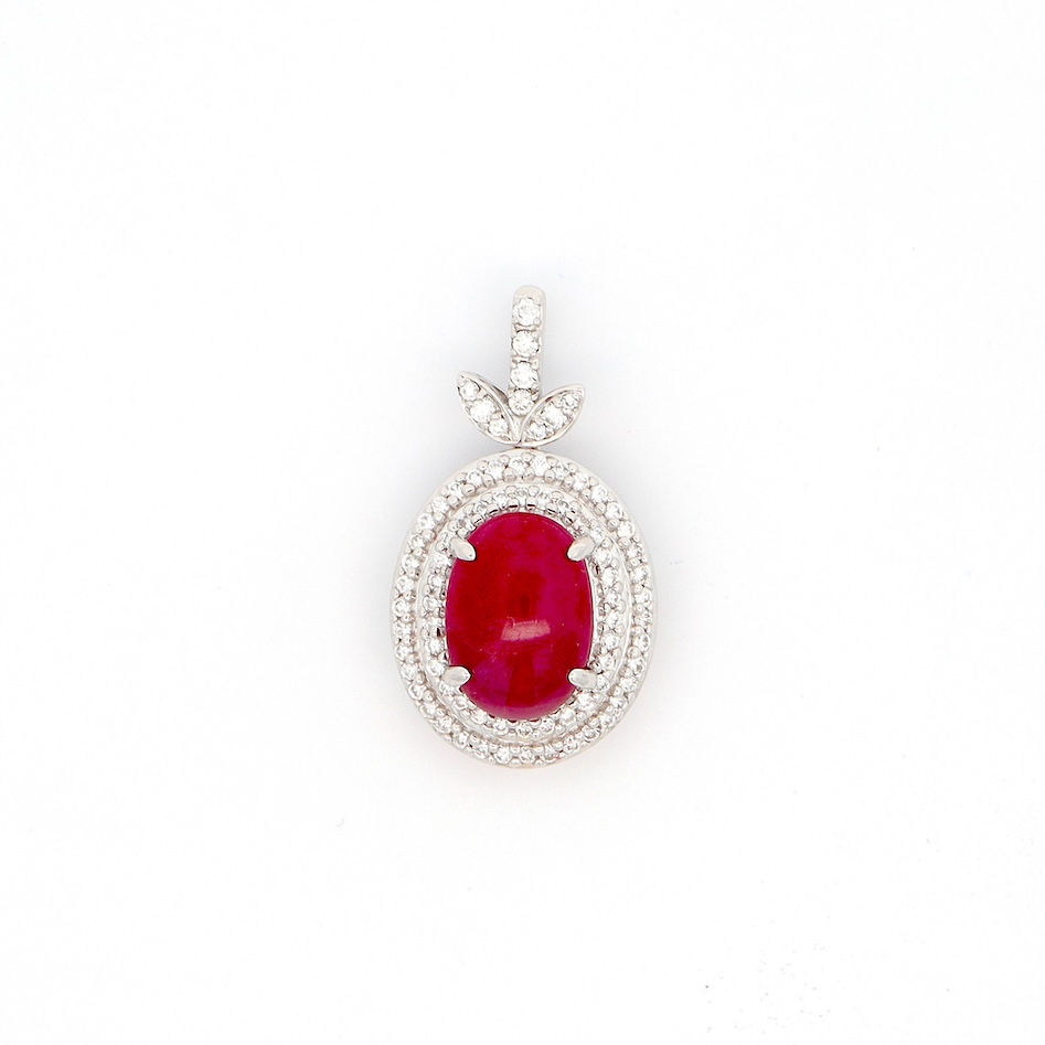 Oval gemstone halo pendant with a double halo of diamonds and a leaf motif bail in fine gold.