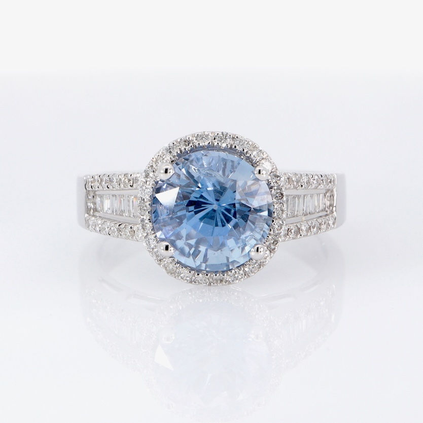 Thumbnail: Bold star gemstone ring with a hidden diamond halo and a wide band of baguette and pavé diamonds.