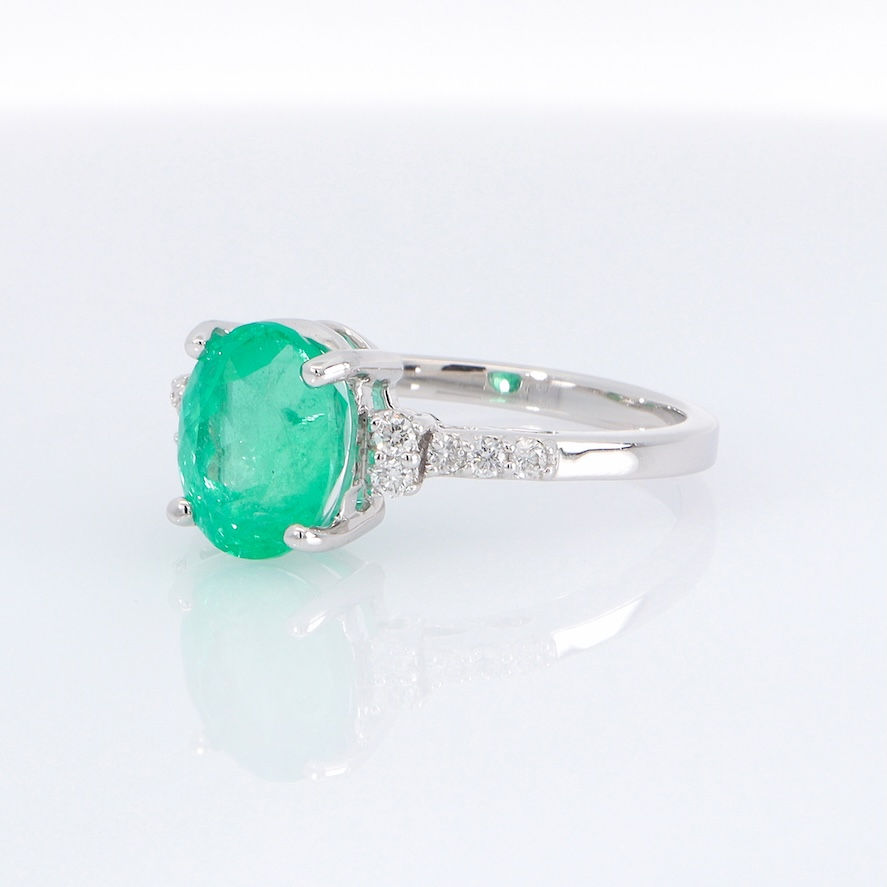 Thumbnail: Classic diamond engagement ring setting with pavé diamond accents and a polished gold band.