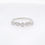 Thumbnail: Geometric diamond ring band with round diamonds set in marquise and square shapes in gold.
