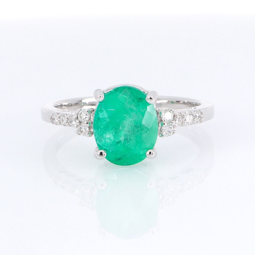 Thumbnail: Classic diamond engagement ring setting with pavé diamond accents and a polished gold band.