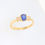Thumbnail: Classic oval gemstone ring with three-stone baguette diamond accents on a gold band.