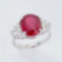 Graduated baguette diamond engagement ring setting for an oval stone in fine gold.