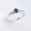 Thumbnail: Blue sapphire diamond ring in fine gold with oval sapphire and diamond accents