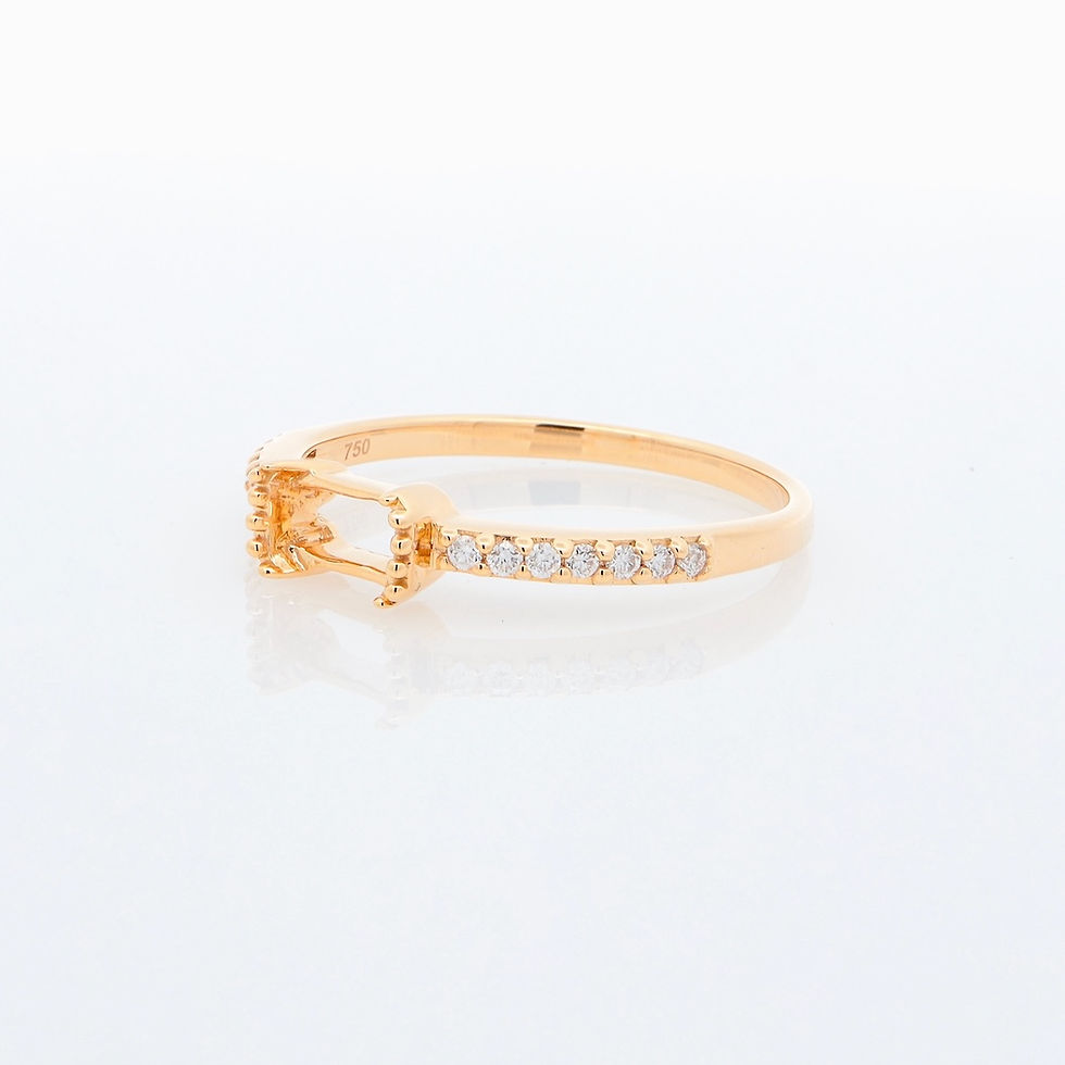 Thumbnail: Minimalist engagement ring setting for an emerald-cut stone with a pavé diamond gold band.