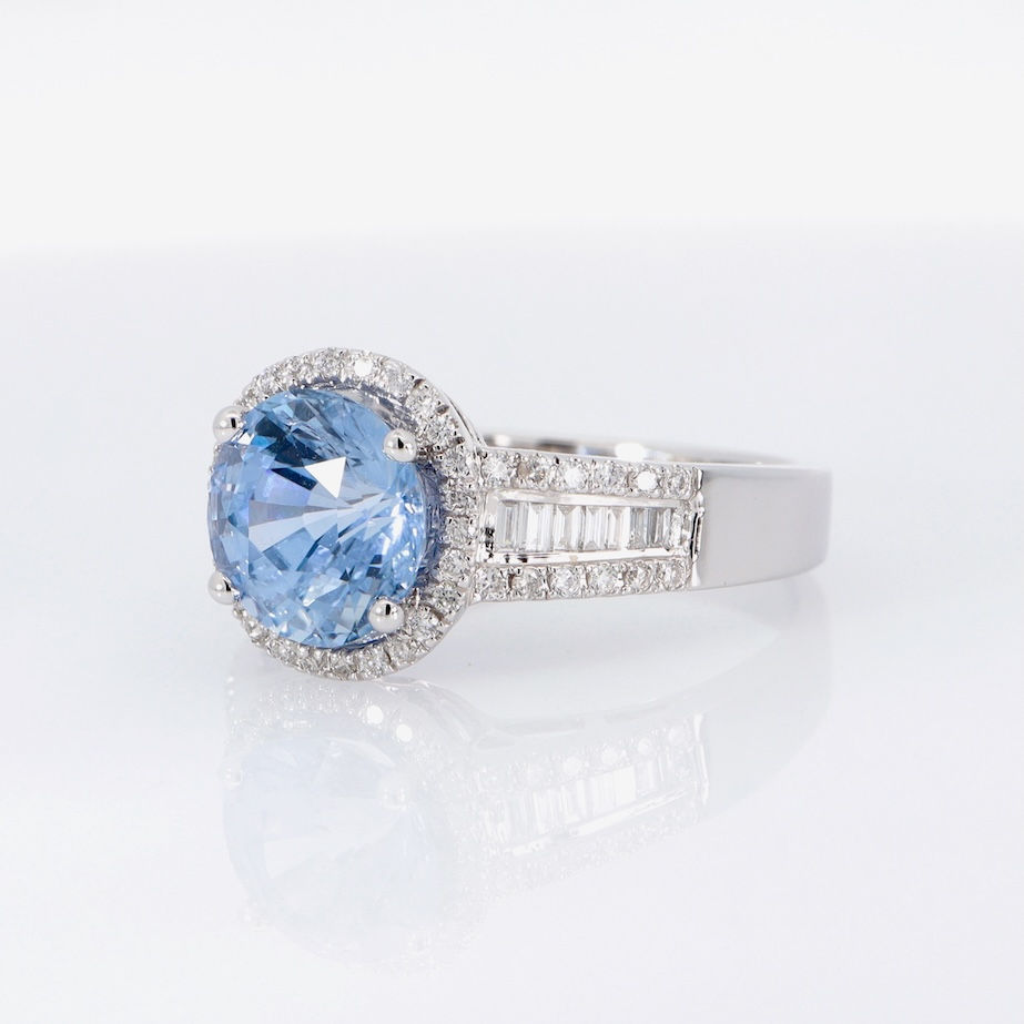 Thumbnail: Bold star gemstone ring with a hidden diamond halo and a wide band of baguette and pavé diamonds.
