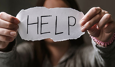 Help sign promoting accountability and support through an abuser intervention program focused on behavior change and healing