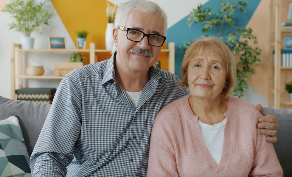 Smiling senior couple partnering together at home