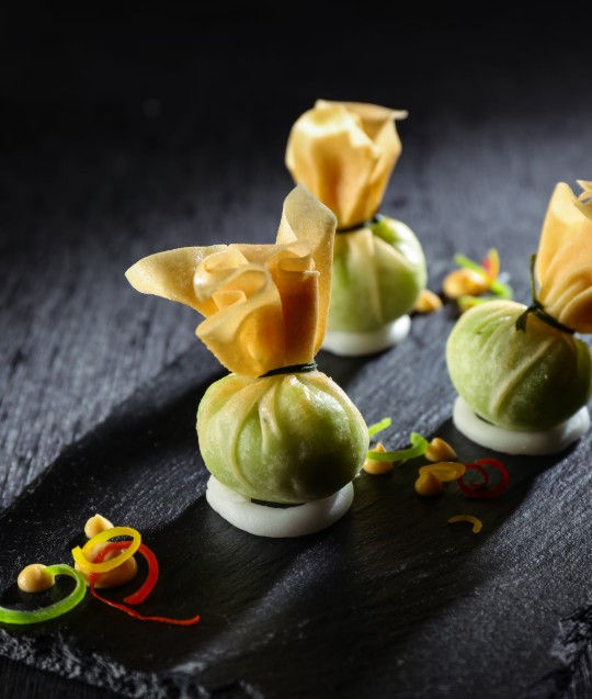 At KOKO, the best way to dine is to let the table fill up gradually with sharing plates rather than ordering standard individual meals. You can enjoy unique dishes and drinks here, unlike many other restaurants in Bengaluru. Start with clean, raw choices and light steamed parcels before moving into richer, heat-driven mains. Mixing textures, like contrasting a soft dumpling with a crunchy roll, keeps the meal engaging. Some recommended picks include: Wild Morel and Truffle Dumplings Crispy Prawn Cheung Fun KOKO Signature Roll Miso Brown Butter Cheesecake KOKO Negroni (cocktail)
